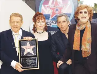  ?? AP PHOTO/DAMIAN DOVARGANES ?? Actors Jerry Stiller, far left, and Anne Meara, right, pose with their children, Ben Stiller and Amy Stiller as they are honored with a star on the Hollywood Walk of Fame in Los Angeles in 2005.
