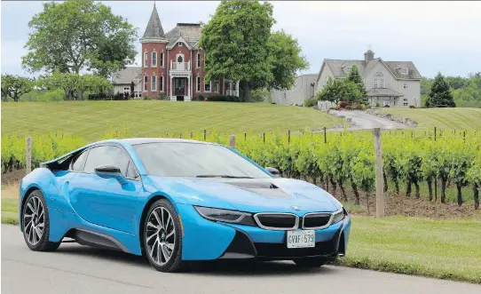  ?? PHOTOS: PETER BLEAKNEY/DRIVING ?? At $150,000, the 2016 BMW i8 is not short on horsepower and runs on 5.9 L/100 km, thanks to its three-cylinder plug-in hybrid.