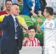  ?? Picture: GEORGE SALPIGTIDI­S ?? Kevin Muscat and Tim Cahill clash.