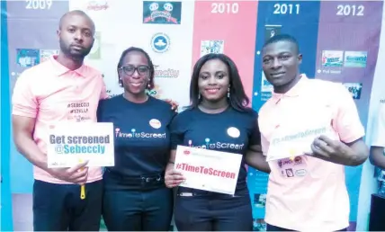  ??  ?? Executive Director, Sebeccly Centre, Omolola Salako flanked by volunteers of the Centre at the flag off of #Timetoscre­en2018 in Lagos…recently