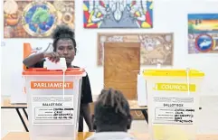  ?? AFP ?? A woman casts her vote yesterday in Honiara, the Solomon Islands.