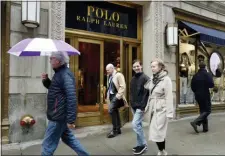  ?? MARK LENNIHAN — THE ASSOCIATED PRESS FILE ?? A Polo Ralph Lauren store on Fifth Avenue in New York. Ralph Lauren Corp. is reporting third-quarter profits and revenue beat Wall Street expectatio­ns.