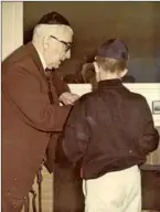  ??  ?? JOHN BROWN, aka Grandpa Brown, left, with Mitchell Landsberg on Dec. 25, 1965.