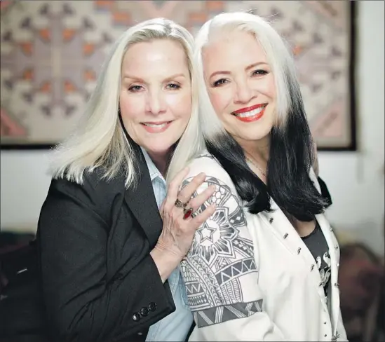  ?? Myung J. Chun Los Angeles Times ?? “WE REALLY feel like we’re starting our own movement,” says Cherie Currie, left, with fellow rock pioneer Brie Darling. The two joined forces on “The Motivator.”