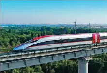  ?? PROVIDED TO CHINA DAILY ?? A bullet train for the high-speed railway network linking the Indonesian capital Jakarta and the city of Bandung takes part in a test run in Qingdao, Shandong province, on Thursday. It will soon be shipped to Indonesia.