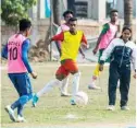  ?? —AFP ?? DHAKA: In this photo taken on February 5, 2020, head coach of Dhaka Football City Club, Mirona (R), reacts as she trains players on a field on the outskirts of Dhaka.