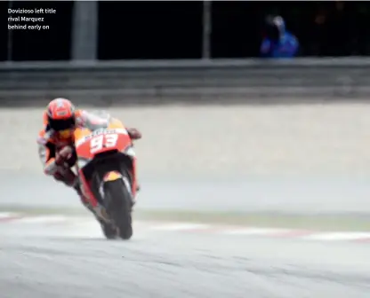  ??  ?? Dovizioso left title rival Marquez behind early on