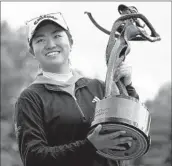  ?? Seth Wenig Associated Press ?? ROSE ZHANG shot a 66 to close her victory and end Nelly Korda’s record-tying five-match win streak.