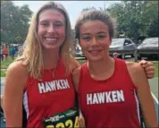  ?? NATE BARNES — THE NEWS-HERALD ?? Hawken sophomores Ella Gilson, left, and Juliana Metz placed first and ninth at the Mentor Cardinal Classic on Sept. 1.