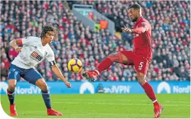  ??  ?? Giorginio Wijnaldum scores Liverpool’s second