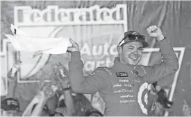  ?? STEVE HELBER/AP ?? Kyle Larson celebrates in victory lane after winning the NASCAR Cup Series race on Saturday at Richmond (Va.) Internatio­nal Raceway in Richmond.