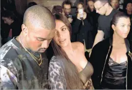  ?? Alain Jocard AFP/Getty Images ?? KANYE WEST, seen here in September with wife Kim Kardashian, was released Wednesday from UCLA Medical Center, where he was taken after a call to 911.