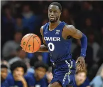  ?? MATT SLOCUM / ASSOCIATED PRESS ?? Xavier’s Souley Boum plays during an
NCAA game in Villanova, Pa., on Jan. 7. A graduate transfer, Boum averages better than 16 points and leads the Musketeers (19-6) in 3-pointers (48), assists and minutes played after moving from UTEP. Boum scored nearly 20 per game last season.