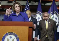  ?? J. SCOTT APPLEWHITE/THE ASSOCIATED PRESS FILE PHOTO ?? Democratic leader Nancy Pelosi has called on Michigan congressma­n John Conyers, right, to resign over “very credible” allegation­s of harassment.