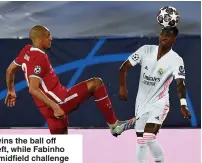  ??  ?? FLYING
Phillips wins the ball off Modric, left, while Fabinho TACKLES makes a midfield challenge
