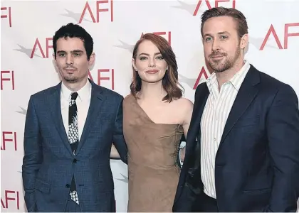  ?? Picture/AP ?? La-La Land director Damien Chazelle, left, with his stars Emma Stone and Ryan Gosling. Chazelle, 32, is a Harvardedu­cated son of university professors and a former jazz drummer.