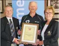  ??  ?? Laytown & Bettystown Golf Club Captain, Bryan Collins and Lady Captain, Rita O’Connor are presented with a certificat­e on the implementa­tion of the Golf Cardiac Response System