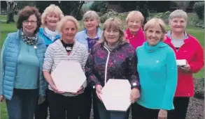  ?? ?? Ladies winners Frances Tobin and Theresa O’Keeffe pictured with second placed Catherine O’Gorman and Tilly Noonan. Ann Daly and Marie Caplice, presented the prizes, also included are Breda Kennedy and Kathleen Grumbridge.