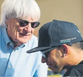  ?? FOTO: AP ?? Ecclestone y Hamilton, Lewis no ha pasado por alto los comentario­s de Bernie a la CNN