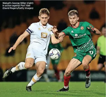  ?? ?? Walsall’s George Miller (right) in action against Port Vale (David Rogers/getty Images)