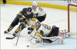  ?? Adrian Kraus ?? Golden Knights goaltender MarcAndre Fleury makes a save on a shot attempt by Buffalo Sabres center Jacob Josefson while Vegas center William Karlsson pursues in the third period of the Knights’ 2-1 shootout victory Saturday in Buffalo, N.Y. The win was...