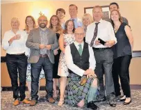  ??  ?? Celebratio­n John Swinney, pictured here with some of his colleagues, marked 20 years in parliament with a dinner in Perth last Friday