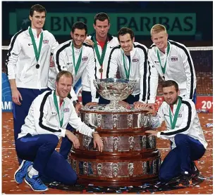  ??  ?? Magnificen­t seven: Britain’s triumphant team with the Davis Cup (clockwise from top left) — Jamie Murray, James Ward, captain Leon Smith, Andy Murray, Kyle Edmund, Dan Evans and Dom Inglot