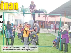  ??  ?? SALAH satu cabaran dan halangan peserta dalam aktiviti larian berhalanga­n.
(Gambar bawah)