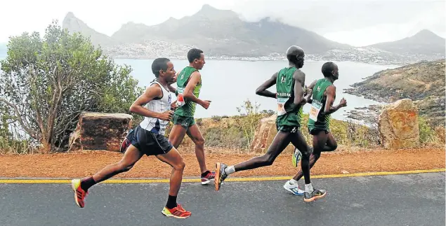  ?? Picture Anadolu Agency/Getty Images/Ashraf Hendricks ?? JOGGING OLD MEMORIES The first Two Oceans marathon attracted just 24 runners; today thousands come from all over the world to enjoy one of running’s most spectacula­r contests.