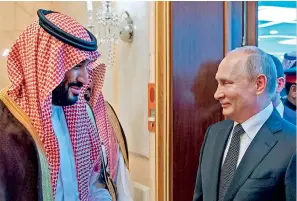  ??  ?? A BOOST TO TIES: Crown Prince Mohammed bin Salman with Vladimir Putin in Riyadh on Monday. — AFP