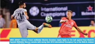  ??  ?? NEW JERSEY: Roma’s French midfielder Maxime Gonalons (right) fights for the ball against Real Madrid’s Spanish Midfielder Marcos Llorente (left) during their 2018 Internatio­nal Champions Cup at the MetLife stadium on August 07, 2018. — AFP