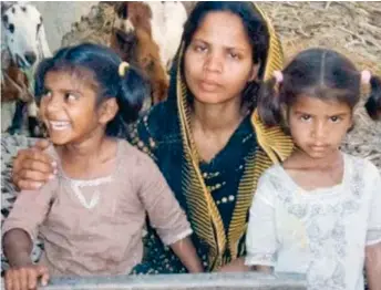  ??  ?? Torn apart: Asia Bibi with daughters Isham and Isha – who are already in Canada