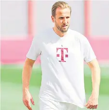  ?? — AFP photo ?? Kane attends a training session in Munich, southern Germany, prior to the UEFA Champions League quarter-final first leg match Arsenal FC v FC Bayern Munich.