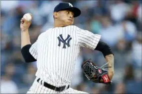  ?? ADAM HUNGER - AP ?? New York Yankees pitcher Jonathan Loaisiga delivers during the third inning of a baseball game against the Tampa Bay Rays, Friday, in New York. Loaisiga was making his major league debut.