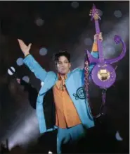  ?? ASSOCIATED PRESS FILE ?? In this Feb. 4, 2007 file photo, Prince performs during the halftime show of the Super Bowl XLI football game at Dolphin Stadium in Miami. A Minnesota judge overseeing Prince’s estate said Thursday, July 28, 2016, he’ll consider allowing cameras in...