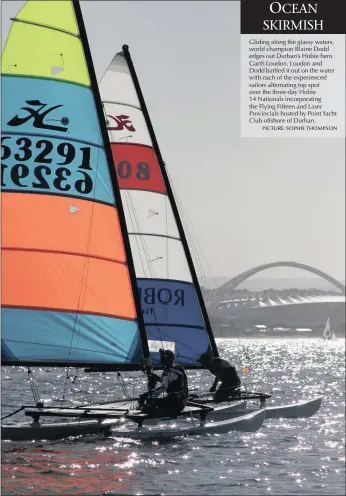  ?? PICTURE: SOPHIE THOMPSON ?? Gliding along the glassy waters, world champion Blaine Dodd edges out Durban’s Hobie hero Garth Loudon. Loudon and Dodd battled it out on the water with each of the experience­d sailors alternatin­g top spot over the three-day Hobie 14 Nationals...