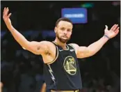  ?? ELSA/GETTY ?? Warriors’ Stephen Curry celebrates in the third quarter of Friday’s Game 4 matchup against the Celtics at TD Garden in Boston, Massachuse­tts.