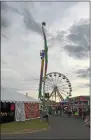  ?? KAREN ALVORD — MEDIANEWS GROUP FILE ?? Fair goers take in the sights at the Great New York State Fair in Geddes on Monday, Aug. 28, 2017.