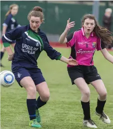  ??  ?? Sinead Regan of the Ursuline College and Ballinrobe’s Ava Keane in action in the Connacht semi-final in the Showground­s.