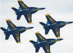  ?? JERRY JACKSON/BALTIMORE SUN ?? The Blue Angels perform over the Severn River as part of the U.S. Naval Academy commission­ing week events in 2022.