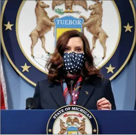  ?? MICHIGAN OFFICE OF THE GOVERNOR VIA AP, FILE ?? Gov. Gretchen Whitmer addresses the state during a March 2speech in Lansing.