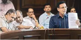  ??  ?? Former defence minister AK Antony with Congress leaders Anand Sharma and Randeep Surjewala at a press conference regarding the Rafael deal, at Parliament House; Union Law Minister Ravi Shankar Prasad speaks in the Rajya Sabha during the Monsoon session of Parliament, in New Delhi on Monday