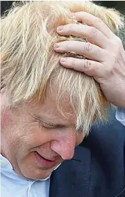  ??  ?? Away on exams day: Boris Johnson