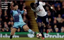  ?? PHOTO: AP ?? Joe Jacobson tackles Moussa Sissoko