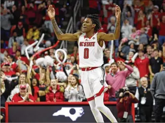  ?? CARLOS OSORIO/ASSOCIATED PRESS ?? Guard Terquavion Smith has helped North Carolina State take a step forward this month, posting ACC victories over Duke, Virginia, Miami and Georgia Tech.