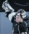  ?? Danny Moloshok, Reuters ?? Kings goalie Jonathan Quick celebrates 1-0 shutout win over the Vancouver Canucks in Game 3 of the teams’ playoff series Sunday.