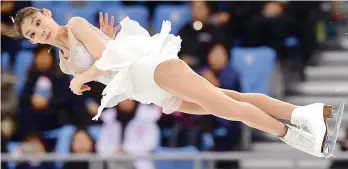  ?? AFP ?? Yu Xiaoyu of China competes in the pair skating short programme of the figure skating event during Pyeongchan­g Winter Olympic Games at the Gangneung Ice Arena in Gangneung on Wednesday. —