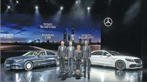  ?? PHOTOS PROVIDED TO CHINA DAILY ?? Four Daimler board members convene to celebrate the world premiere of the new S-Class at the Shanghai World Expo on Tuesday.