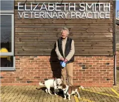  ??  ?? Mr Marshall with his Jack Russells Archie and