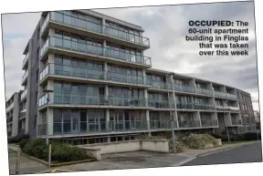  ??  ?? occupied: The 60-unit apartment building in Finglas that was taken over this week